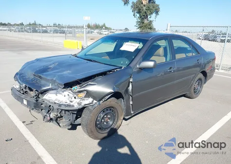 2005 Toyota Camry Le z USA, uszkodzony, nr VIN 4T1BE30K25U519656